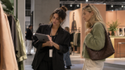 A furniture buyer asking an AI shopping assistant in a B2B webshop for dining chairs by material and intended use.